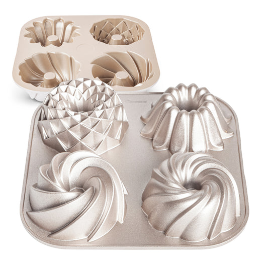 TETRAD-vorm voor 4 minicakes, diameter 10 cm x 4,5 cm hoog, dubbele antiaanbaklaag, bestendig gegoten aluminium, uniform koken, roségouden kleur.