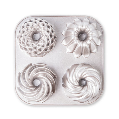 Moule TETRAD pour 4 mini cakes, diamètre 10 cm x 4,5 cm de hauteur, Double Couche Antiadhésive, Fonte d'Aluminium Résistante, Cuisson Uniforme, Couleur Or Rose.