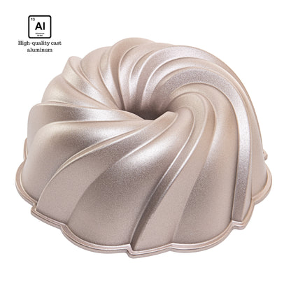 NEW ARRIVAL Molde TWIST para bizcocho y tarta, aluminio fundido con doble capa antiadherente, cocción uniforme, color oro rosa, Ø24 cm, 2.5 L