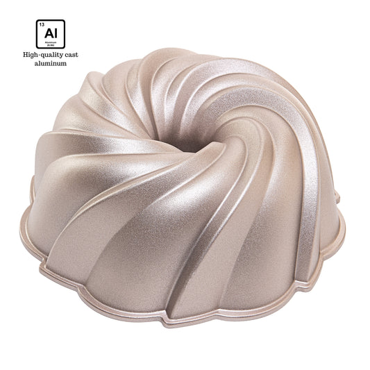 NEW ARRIVAL Molde TWIST para bizcocho y tarta, aluminio fundido con doble capa antiadherente, cocción uniforme, color oro rosa, Ø24 cm, 2.5 L
